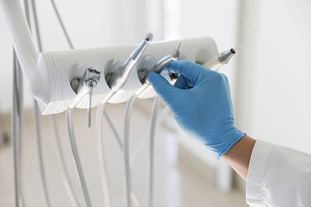 Professional Tooth Extraction technician working in Lake Odessa, MI